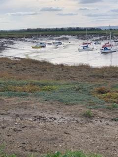 Turning inland towards Highbridge - low tide leaving the yachts high and dry